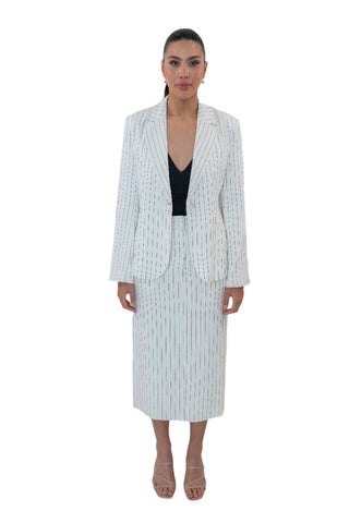 Pinstripe midi skirt styled with its matching blazer and black singlet.