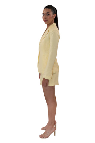 Side view of linen blazer with matching mini dress.