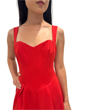 Close up view of the sweetheart neckline on the red mini dress.